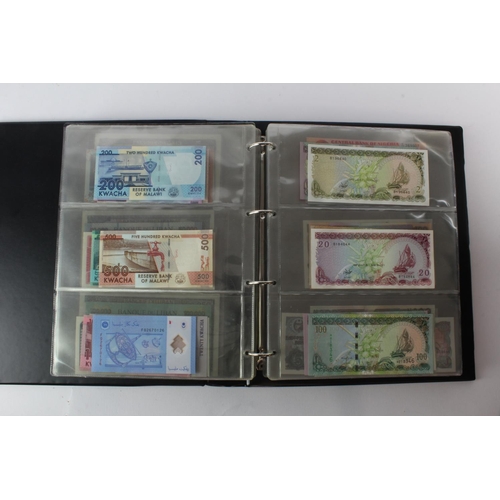 474 - World (178) an Uncirculated collection of world notes in album, all different (some same design and ... 