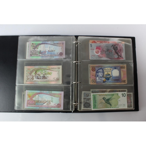 474 - World (178) an Uncirculated collection of world notes in album, all different (some same design and ... 