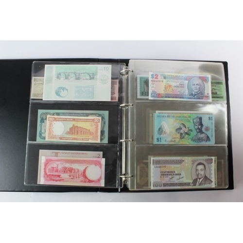 474 - World (178) an Uncirculated collection of world notes in album, all different (some same design and ... 