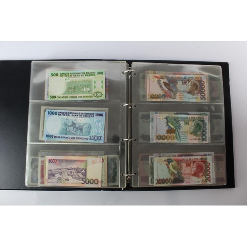 474 - World (178) an Uncirculated collection of world notes in album, all different (some same design and ... 