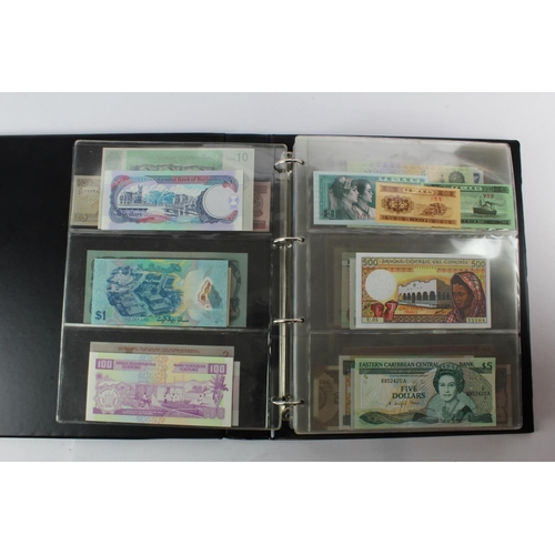 474 - World (178) an Uncirculated collection of world notes in album, all different (some same design and ... 