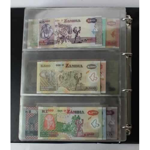 474 - World (178) an Uncirculated collection of world notes in album, all different (some same design and ... 