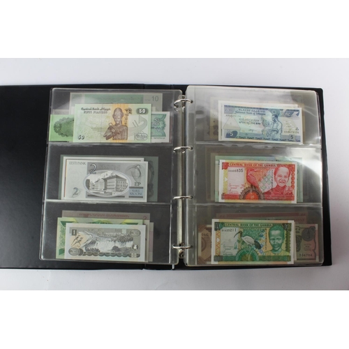 474 - World (178) an Uncirculated collection of world notes in album, all different (some same design and ... 