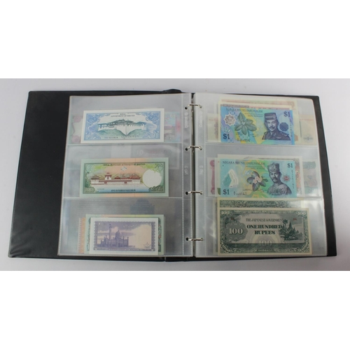 494 - World, Asia (205) an Uncirculated group in album, all different with a range of dates and signature ... 