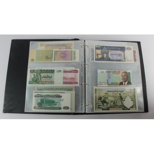 494 - World, Asia (205) an Uncirculated group in album, all different with a range of dates and signature ... 