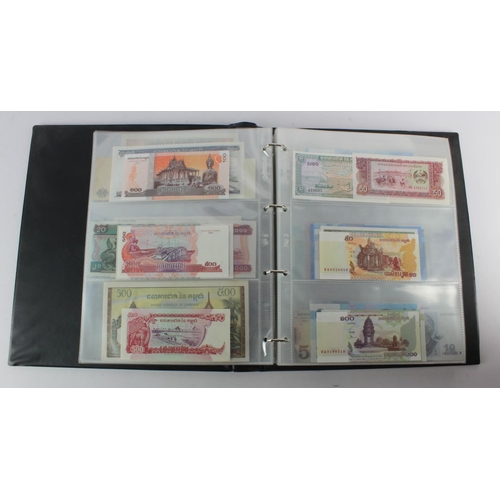 494 - World, Asia (205) an Uncirculated group in album, all different with a range of dates and signature ... 