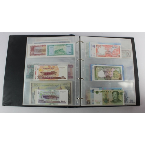 494 - World, Asia (205) an Uncirculated group in album, all different with a range of dates and signature ... 