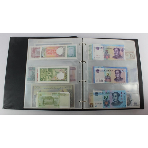 494 - World, Asia (205) an Uncirculated group in album, all different with a range of dates and signature ... 