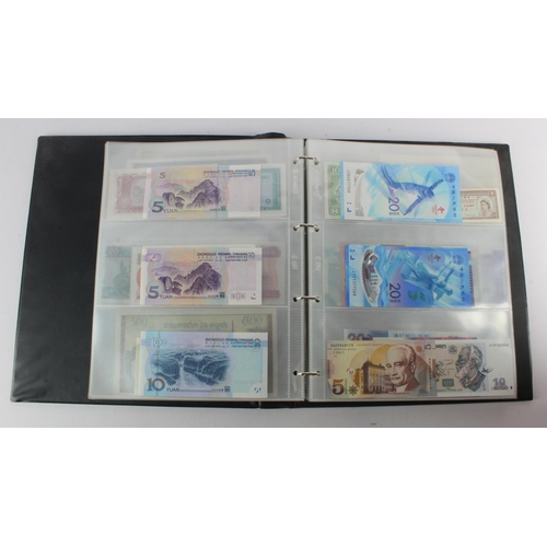 494 - World, Asia (205) an Uncirculated group in album, all different with a range of dates and signature ... 