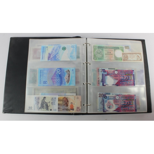 494 - World, Asia (205) an Uncirculated group in album, all different with a range of dates and signature ... 