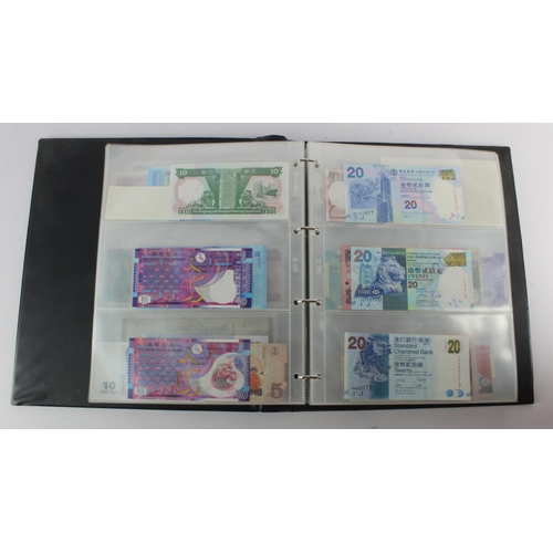 494 - World, Asia (205) an Uncirculated group in album, all different with a range of dates and signature ... 