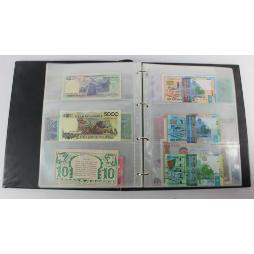 494 - World, Asia (205) an Uncirculated group in album, all different with a range of dates and signature ... 