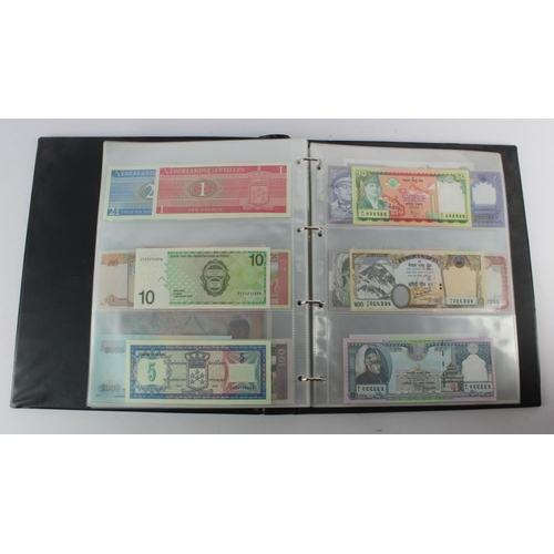 494 - World, Asia (205) an Uncirculated group in album, all different with a range of dates and signature ... 