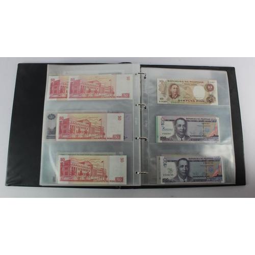 494 - World, Asia (205) an Uncirculated group in album, all different with a range of dates and signature ... 