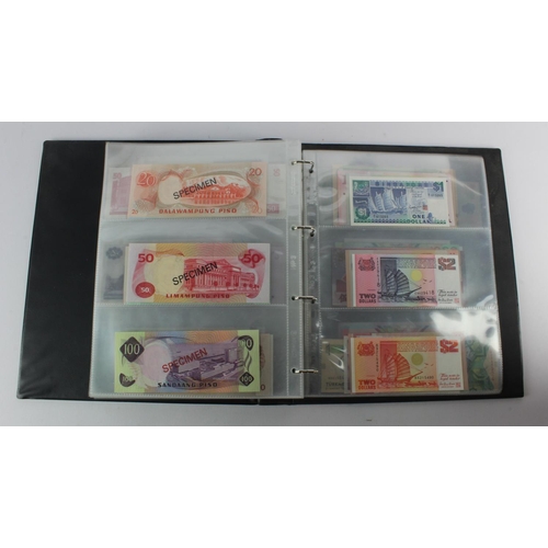 494 - World, Asia (205) an Uncirculated group in album, all different with a range of dates and signature ... 