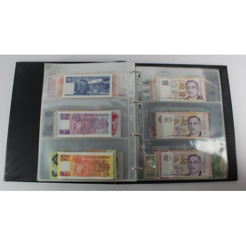 494 - World, Asia (205) an Uncirculated group in album, all different with a range of dates and signature ... 