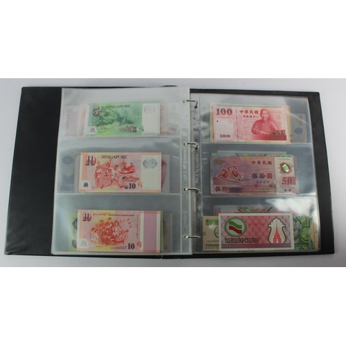 494 - World, Asia (205) an Uncirculated group in album, all different with a range of dates and signature ... 