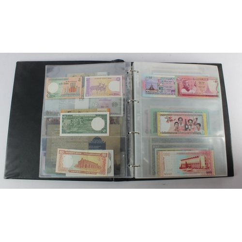 494 - World, Asia (205) an Uncirculated group in album, all different with a range of dates and signature ... 