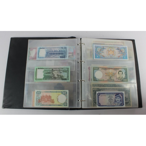 494 - World, Asia (205) an Uncirculated group in album, all different with a range of dates and signature ... 