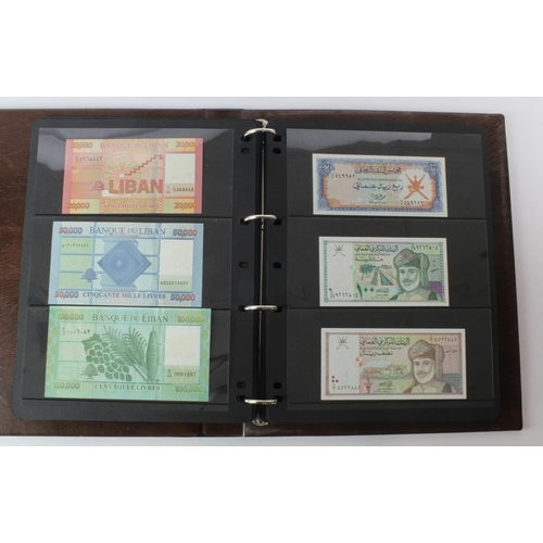 499 - World, Middle East (125) an Uncirculated group in album comprising Bahrain, Iran, Iraq, Jordan, Kuwa... 