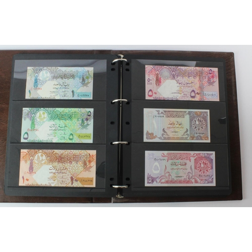 499 - World, Middle East (125) an Uncirculated group in album comprising Bahrain, Iran, Iraq, Jordan, Kuwa... 