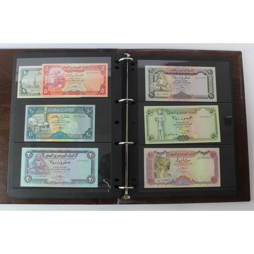 499 - World, Middle East (125) an Uncirculated group in album comprising Bahrain, Iran, Iraq, Jordan, Kuwa... 