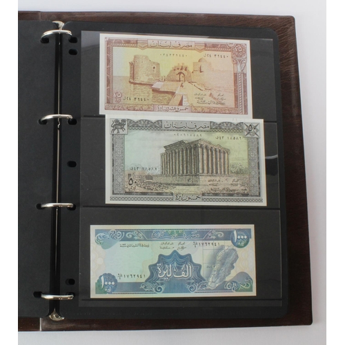 499 - World, Middle East (125) an Uncirculated group in album comprising Bahrain, Iran, Iraq, Jordan, Kuwa... 