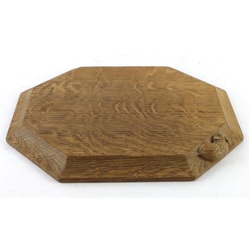 1068 - Robert 'Mouseman' Thompson. Octagonal cheese / bread board, with signature mouse to edge, 30.5cm x 2... 