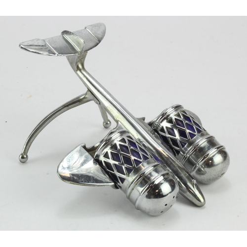 1079 - Silver plated salt & pepper cruet set in the form of an aeroplane (Reg. no. 876205), both with blue ... 