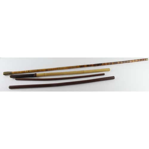 1085 - Sticks. A group of four swagger & walking sticks, including leather examples, longest 95.5cm approx.