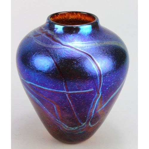 681 - Carin Von Drehle. Iridescent blue trailed baluster vase, signed along base edge. Made during her tim... 