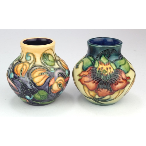 698 - Moocroft. Two small Moorcroft vases 'Anna Lily' & 'Celtic Web' patterns, makers marks to base of eac... 