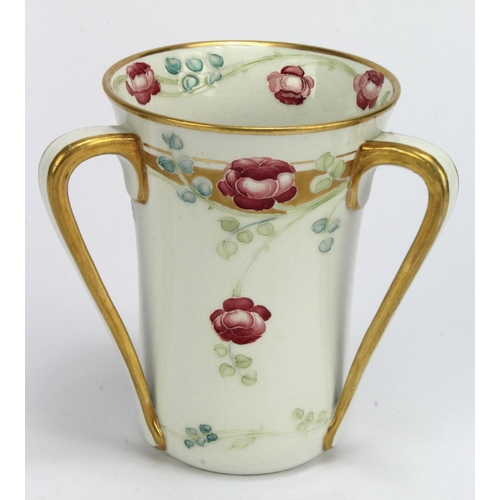 708 - Moorcroft MacIntyre. A William Moorcroft for James MacIntyre three handled loving cup, circa early 2... 