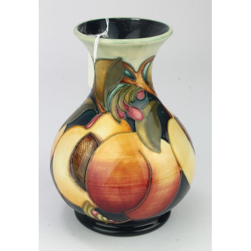 710 - Moorcroft 'Peaches' pattern vase, designed by Emma Bossons, dated 2009, makers marks to base, height... 