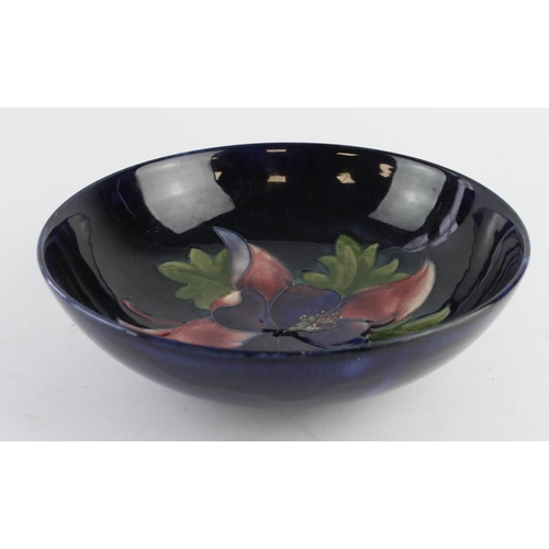 712 - Moorcroft Pottery Clematis pattern fruit bowl, makers label and marks to base, diameter 24cm approx.