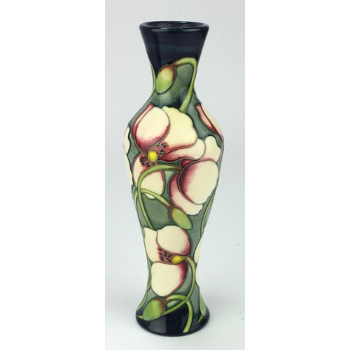 718 - Moorcroft slender vase, dated 2009, makers marks to base, height 20.5cm approx.