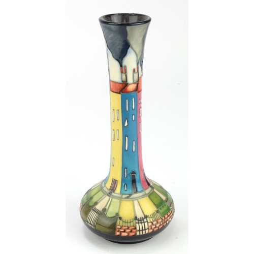 720 - Moorcroft slender vase, depicting houses of various colours, designed by Kerry Goodwin, dated 2012, ... 