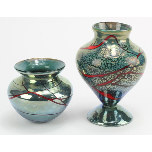 728 - Pair of the red trailed metallic blue lustre vases. The first a small bulbous shape with flared rim.... 