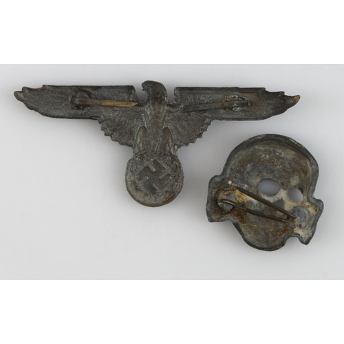 1255 - German pair of SS hat badges.