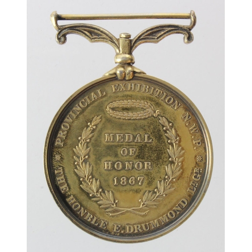 1412 - Medal of Honor 1867, Provincial Exhibition N.W.P. The Honble E.Drummond. Medal named to edge (Lieutt... 