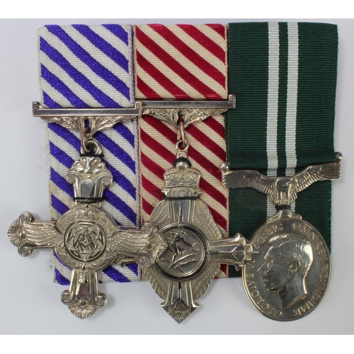 1473 - RAF Gallantry medals DFC, AFC and Air Efficiency medals mounted for wearing museum quality copies.