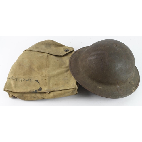 1571 - WW1 US steel Brodie helmet nice example complete with lining and chin strap with traces of sergeant ... 