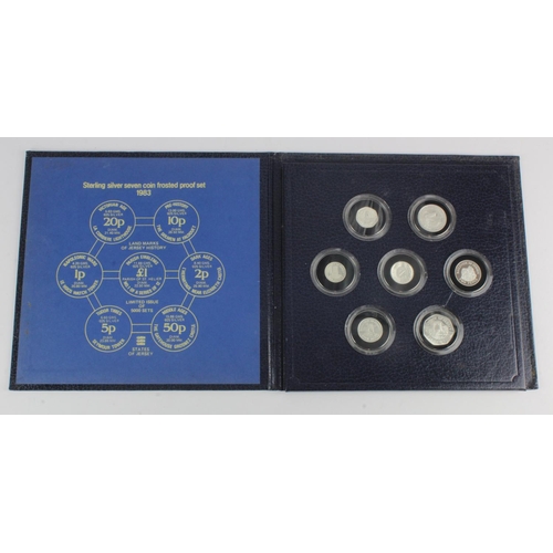 333 - Jersey: Sterling silver seven coin frosted proof set 1983, FDC in original folder (needs re-gluing)