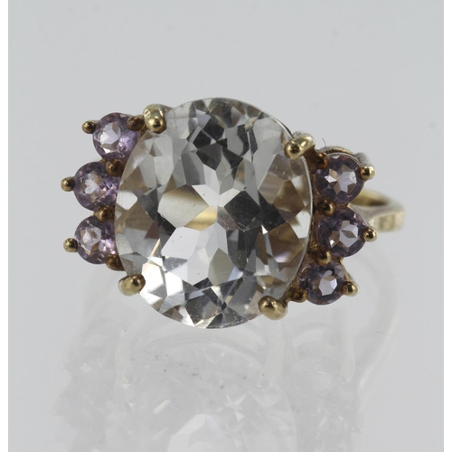 125 - 9ct yellow gold Glacier Topaz and Rose de France Amethyst dress ring, topaz 7.728ct, six round ameth... 