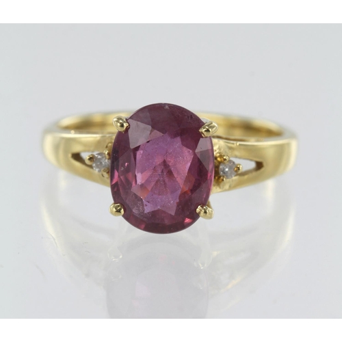 126 - 18ct yellow gold diamond and ruby ring, one oval 2.106ct Madagascan ruby, two round diamonds TDW 0.0... 