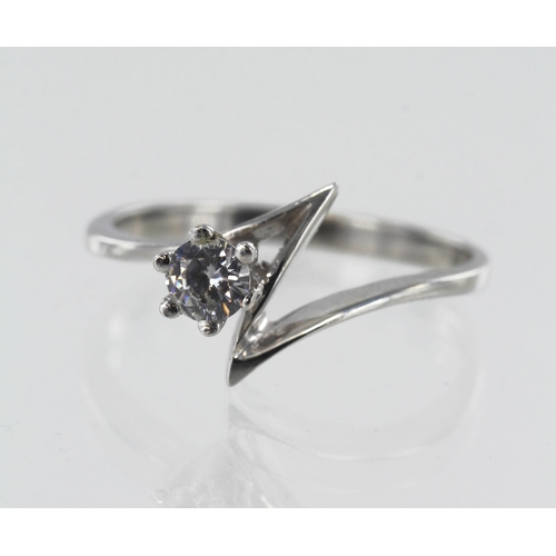 127 - White gold (tests 18ct) contemporary diamond solitaire ring, one round brilliant cut approx. 0.22ct,... 