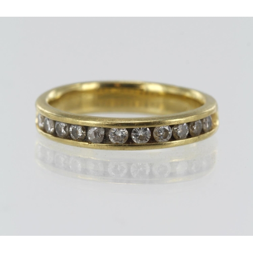 130 - Yellow gold (tests 18ct) diamond half eternity ring, eleven round brilliant cuts, TDW approx. 0.55ct... 