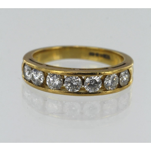 134 - 18ct yellow gold diamond half eternity ring,  seven round brilliant cuts TDW approx. 0.84ct, channel... 