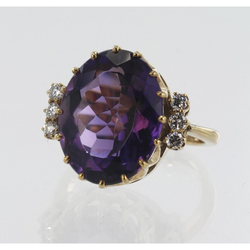 174 - Yellow gold (tests 9ct) diamond and amethyst cocktail ring, deep purple amethyst approx. 15.65ct, me... 