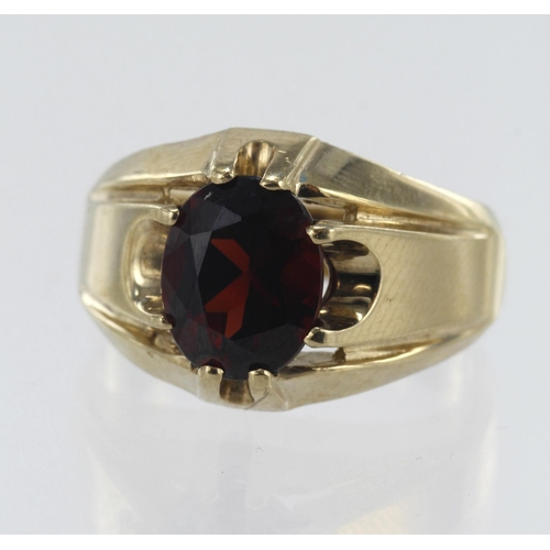 182 - 9ct yellow gold garnet solitaire ring, garnet measures 10mm x 8mm, finger size R/S, weight 7.6g.